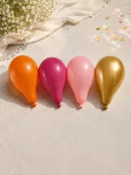 בלונים בצבעי פסטל וזהב